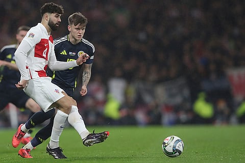 UEFA Nations League: Croatia's Josko Gvardiol, left, duels for the ball with Scotland's Ben Doak