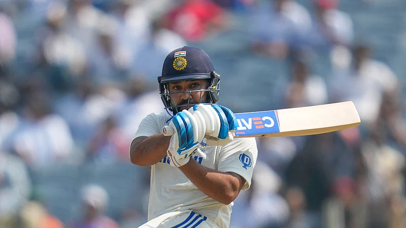 Indias captain Rohit Sharma plays a shot during day three. AP Photo.jpg