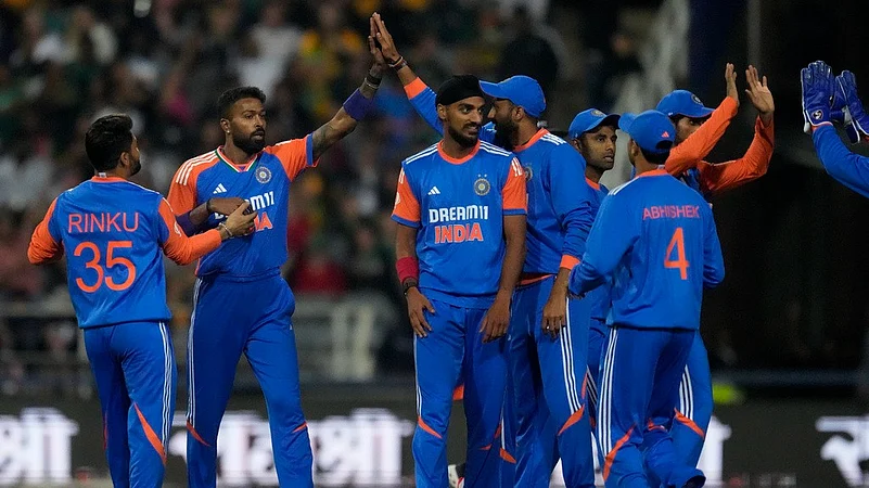 India celebrate the wicket of South Africas Ryan Rickelton during the fourth T20I