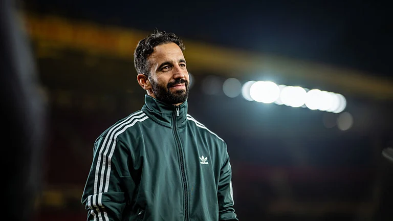 Ruben Amorim poses at Old Trafford - null
