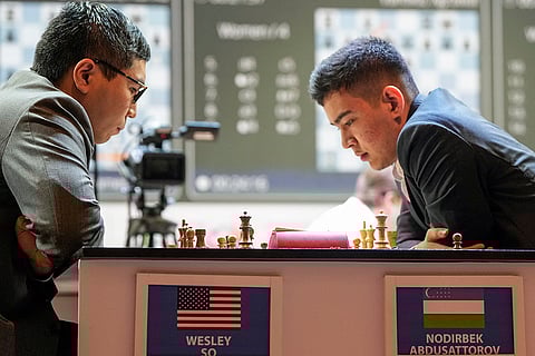 Tata Steel Chess India Rapid: Uzbek GM Nodirbek Abdusattarov (R) plays against USA GM Wesley So