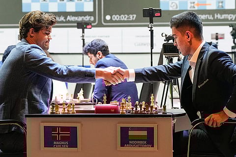 Tata Steel Chess India Rapid: Magnus Carlsen and Uzbek GM Nodirbek Abdusattarov exchange greeting
