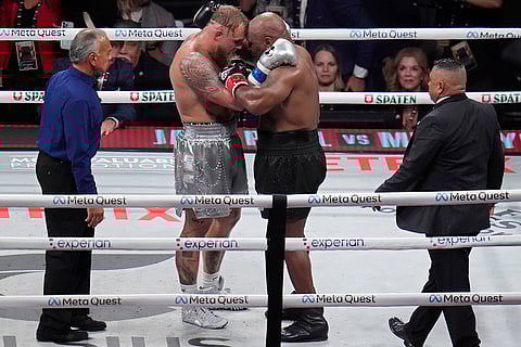 Tyson vs Paul Boxing: Jake Paul, left, and Mike Tyson embrace after match