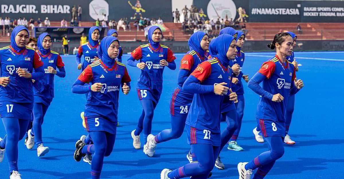 X/HockeyIndia : Malaysia women's hockey team.