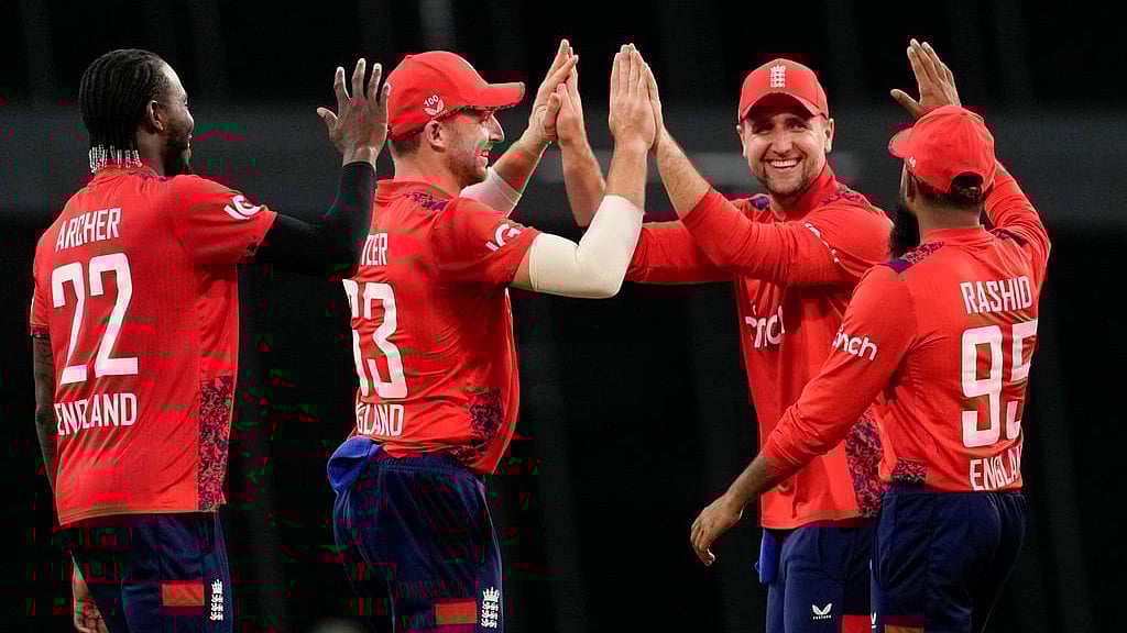 AP/Ricardo Mazalan : England cricket team in action.