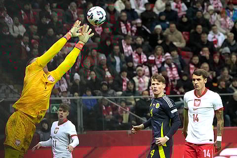 Nations League Soccer: Poland's goalkeeper Lukasz Skorupski stops the ball