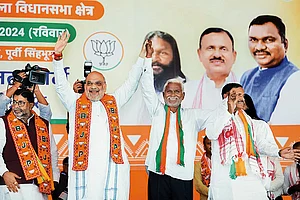 | Photo: PTI : Poll Pitch: Amit Shah and Champai Soren at a rally