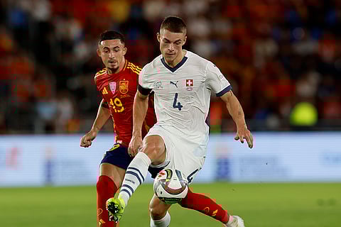 Nations League Soccer: Switzerland's Miro Muheim fights for the ball against Spain's Yeremy Pino
