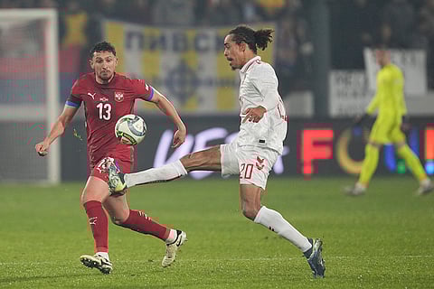 Nations League Soccer: Denmark's Yussuf Poulsen clears the ball in front of Serbia's Milos Veljkovic