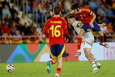 Nations League Soccer: Spain's Laporte fights for the ball against Switzerland's Abian Hajdari