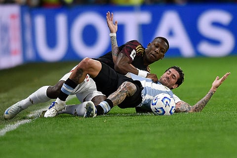Football World Cup 2026 Qualifiers: Peru's Luis Advincula, left, and Argentina's Rodrigo De Paul