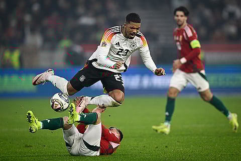 Nations League Soccer: Germany's Benjamin Henrichs is fouled by Hungary's Szabolcs Schon
