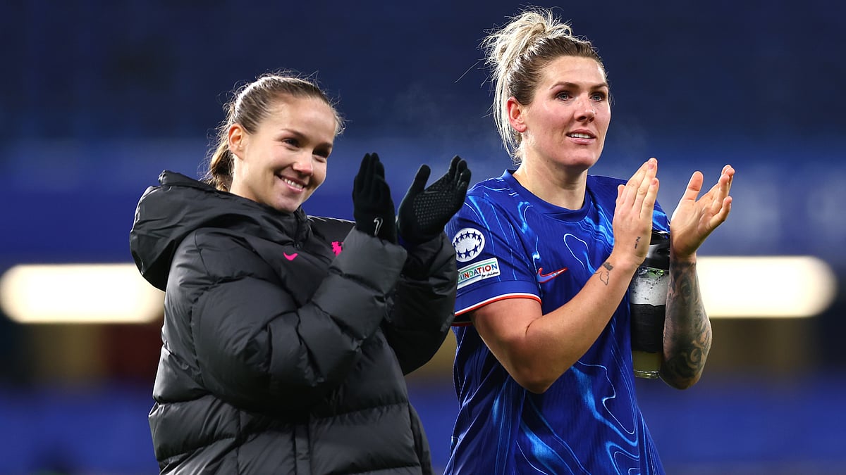 Guro Reiten and Millie Bright celebrate Chelsea's win.