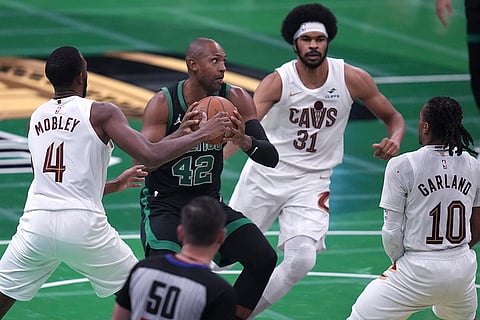 NBA Basketball: Celtics center Al Horford (42) drives against the Cavaliers