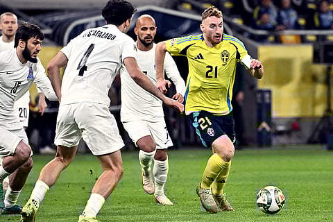 Nations League Soccer: Sweden's team captain Dejan Kulusevski, right, and Azerbaijan's Bahlul Mustafazada, front, challenge for the ball