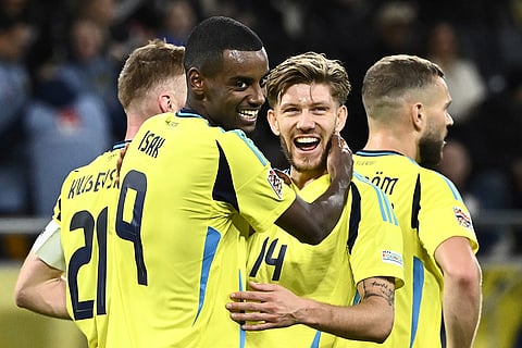 Nations League Soccer: Sweden's Alexander Isak, front, celebrates after scoring his side's fourth goal
