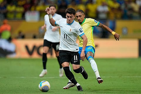 Football World Cup 2026 Qualifiers: Uruguay's Facundo Pellistri, front, is challenged by Brazil's Raphinha