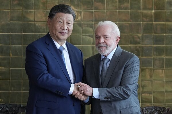 AP : Brazilian President Luiz Inacio Lula da Silva welcomes his Chinese counterpart Xi Jinping