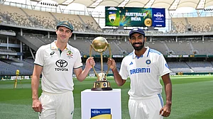 Photo: X | ICC : Australia captain Pat Cummins and India captain Jasprit Bumrah with Border-Gavaskar Trophy (BGT).