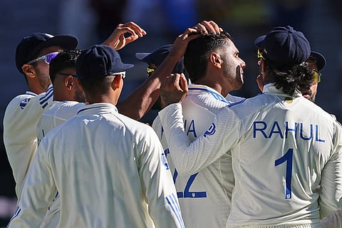 IND Vs AUS 1st Test, Day 1: India's Harshit Rana is congratulated by teammates after taking the wicket of Australia's Travis Head