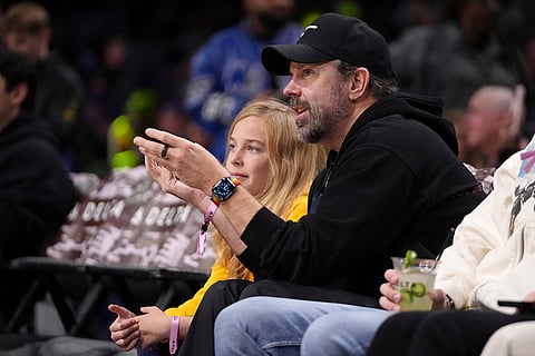 NBA: Actor Jason Sudeikis, right, watches with his son Otis