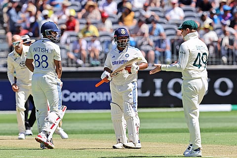 IND Vs AUS 1st Test, Day 1: Australia's Steve Smith, right, gestures to India's Nitish Kumar Reddy