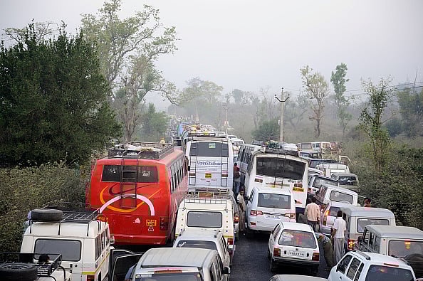 Frédéric Soltan/Corbis via Getty Images : Pilgrims on the way to Kumbh Mela in Haridwar. Haridwar, located in the foothills of Himalaya, is an important center of pilgrimage for Hindus on February 10, 2010 in India