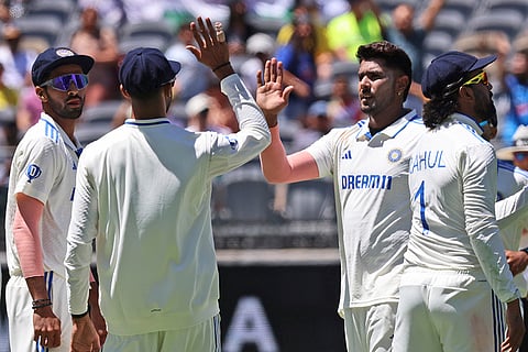 IND Vs AUS 1st Test, Day 2: India's Harshit Rana, second right, celebrates with teammates the wicket of Australia's Nathan Lyon