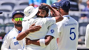 AP/Trevor Collens : India's captain Jasprit Bumrah celebrates the wicket of Australia's Alex Carey on the second day of the first Test in Perth.
