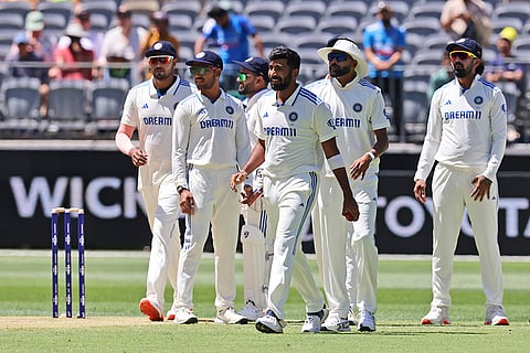 IND Vs AUS 1st Test, Day 2: Jasprit Bumrah, center, celebrates the wicket of Australia's Alex Carey and his fifth