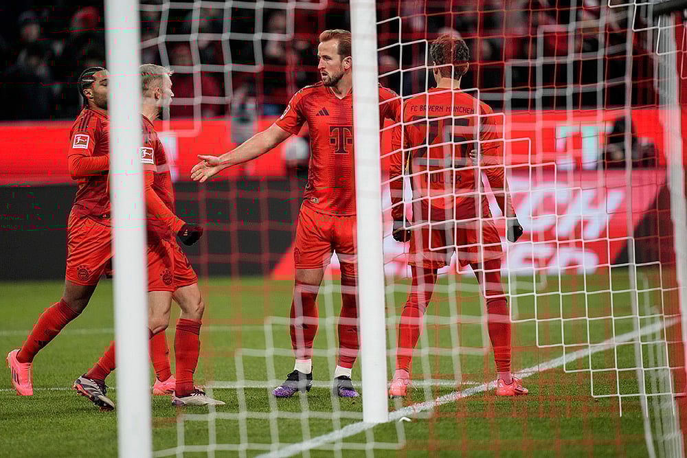 | Photo: AP/Matthias Schrader : Bundesliga 2024-25: Bayern's Harry Kane, second right, celebrates with teammates after scoring his side's second goal 