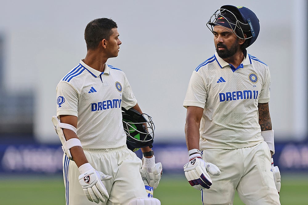 | Photo: AP/Trevor Collens : IND Vs AUS 1st Test, Day 2: India's Yashasvi Jaiswal, left, and teammate KL Rahul leave the field at the end of play 