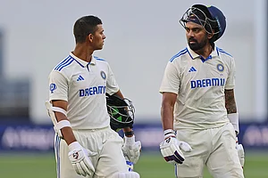 | Photo: AP/Trevor Collens : IND Vs AUS 1st Test, Day 2: India's Yashasvi Jaiswal, left, and teammate KL Rahul leave the field at the end of play