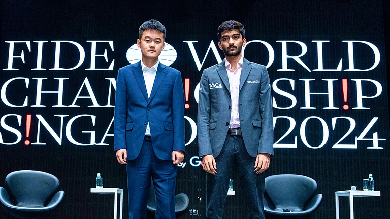 Defending champion Ding Liren (L) with D Gukesh. - Photo: X