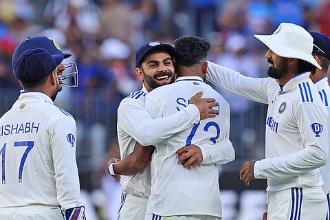 IND Vs AUS 1st Test, Day 3: India's Mohammed Siraj is hugged by teammate Virat Kohli after taking the wicket of Pat Cummins