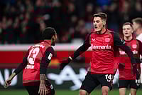 Bundesliga: Schick Stars As Bayer 04 Leverkusen Beat Heidenheim | Photo: Marius Becker/dpa via AP : Bundesliga 2024-25: Leverkusen's scorer Patrik Schick and his teammate celebrate their side's fourth goal