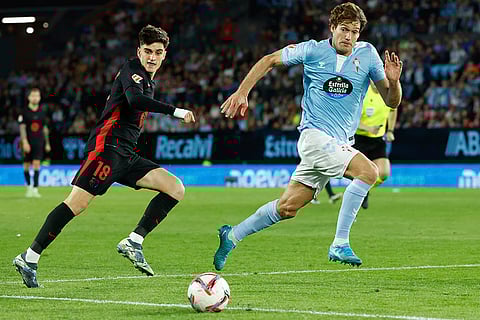 La Liga: Celta's Marcos Alonso, right, and Barcelona's Pau Victor go for the ball
