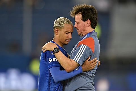 Copa Sudamericana 2024 Final: Coach Fernando Diniz of Brazil's Cruzeiro embraces Matheus Pereira