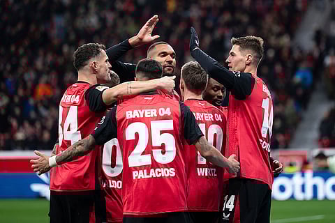 Bundesliga 2024-25: Leverkusen's scorer Patrik Schick, right, and his teammates celebrate their side's third goal