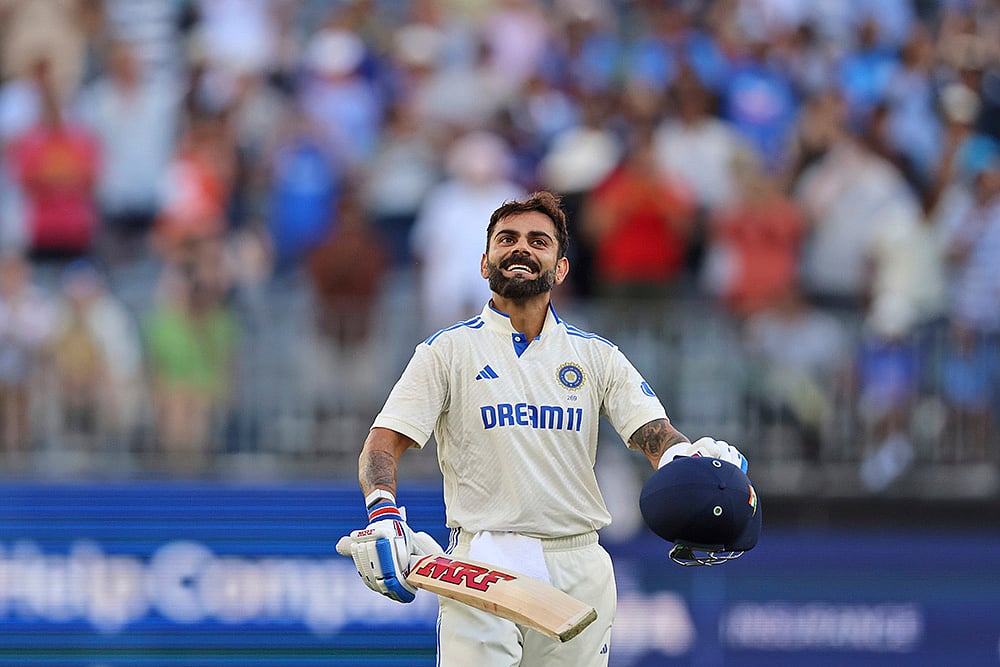 | Photo: AP/Trevor Collens : IND Vs AUS 1st Test, Day 3: India's Virat Kohli celebrates his century