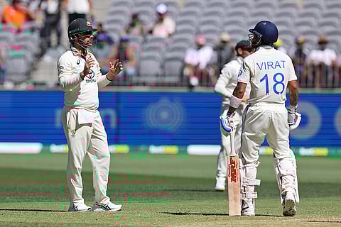 IND Vs AUS 1st Test, Day 3: Australia's Travis Head, left, and India's Virat Kohli exchange words