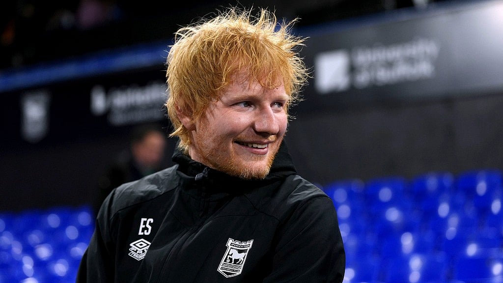 Bradley Collyer/PA via AP : Ed Sheeran at the English Premier League match between Ipswich Town and Manchester United.