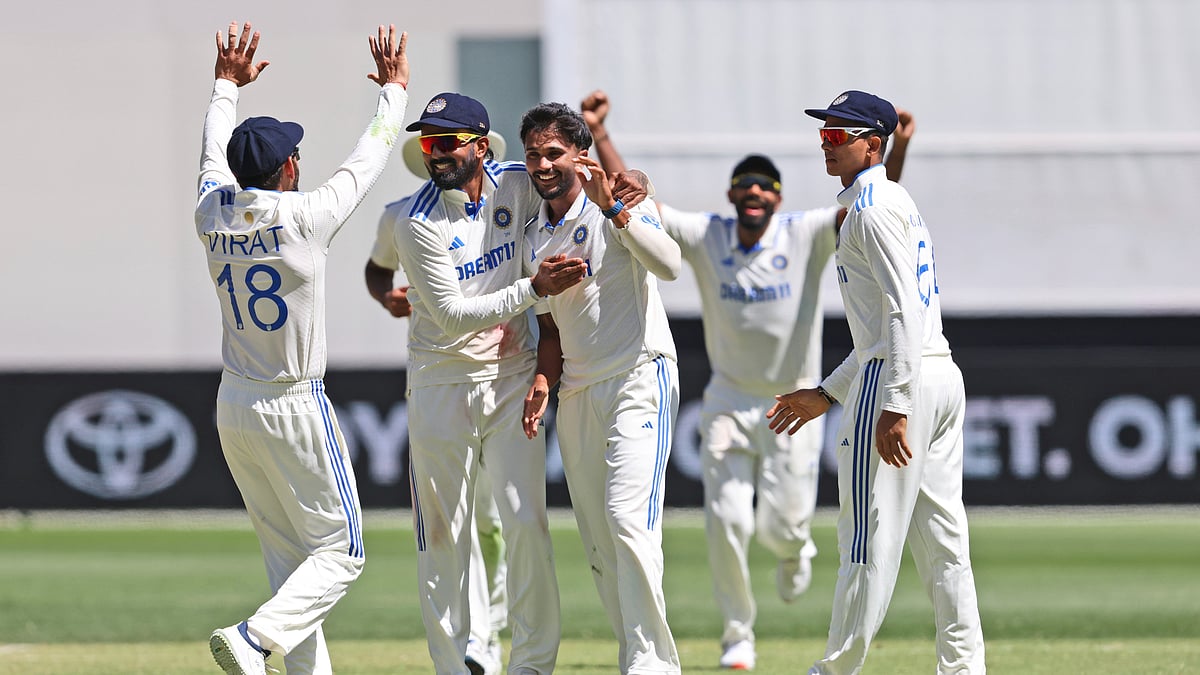 Indias Nitish Kumar Reddy, centre, celebrates with teammates. AP Photo