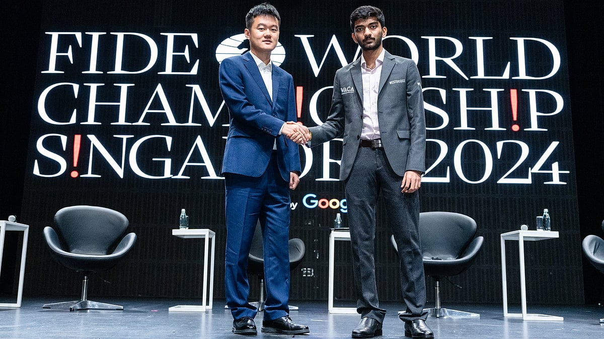 FIDE : Chinese GM Ding Liren (left) with his Indian competitor D Gukesh at the Press Conference & Opening Ceremony of the FIDE World Championship Match 2024.