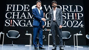 FIDE : Chinese GM Ding Liren (left) with his Indian competitor D Gukesh at the Press Conference & Opening Ceremony of the FIDE World Championship Match 2024.