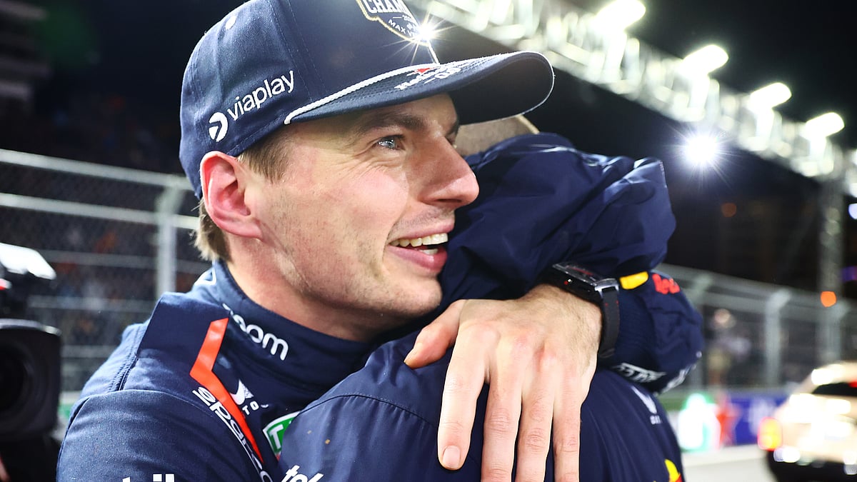 Max Verstappen celebrates after wrapping up the Formula One title