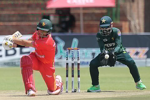 ZIM vs PAK 2nd ODI: Zimbabwe's Craig Ervine, left, at the wicket as Pakistan's wicket keeper Mohammad Rizwan catches the ball