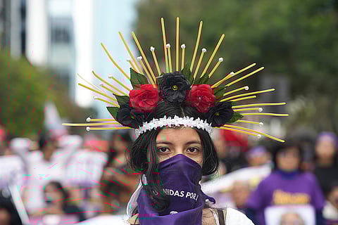 Marieta Correa takes part in a march in Lima, Peru