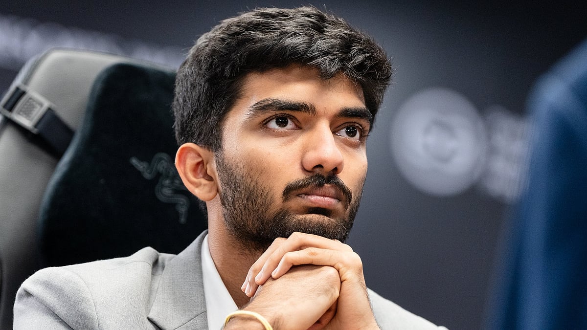 Photo: X/FIDE : D Gukesh in action during Game 1 of the Chess World Championship against Ding Liren in Singapore.