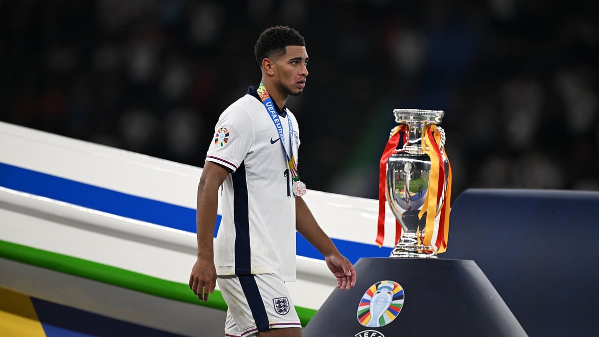 Jude Bellingham and the Euro 2024 trophy.